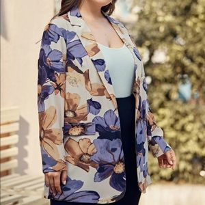 Woman’s purple/yellow floral blazer